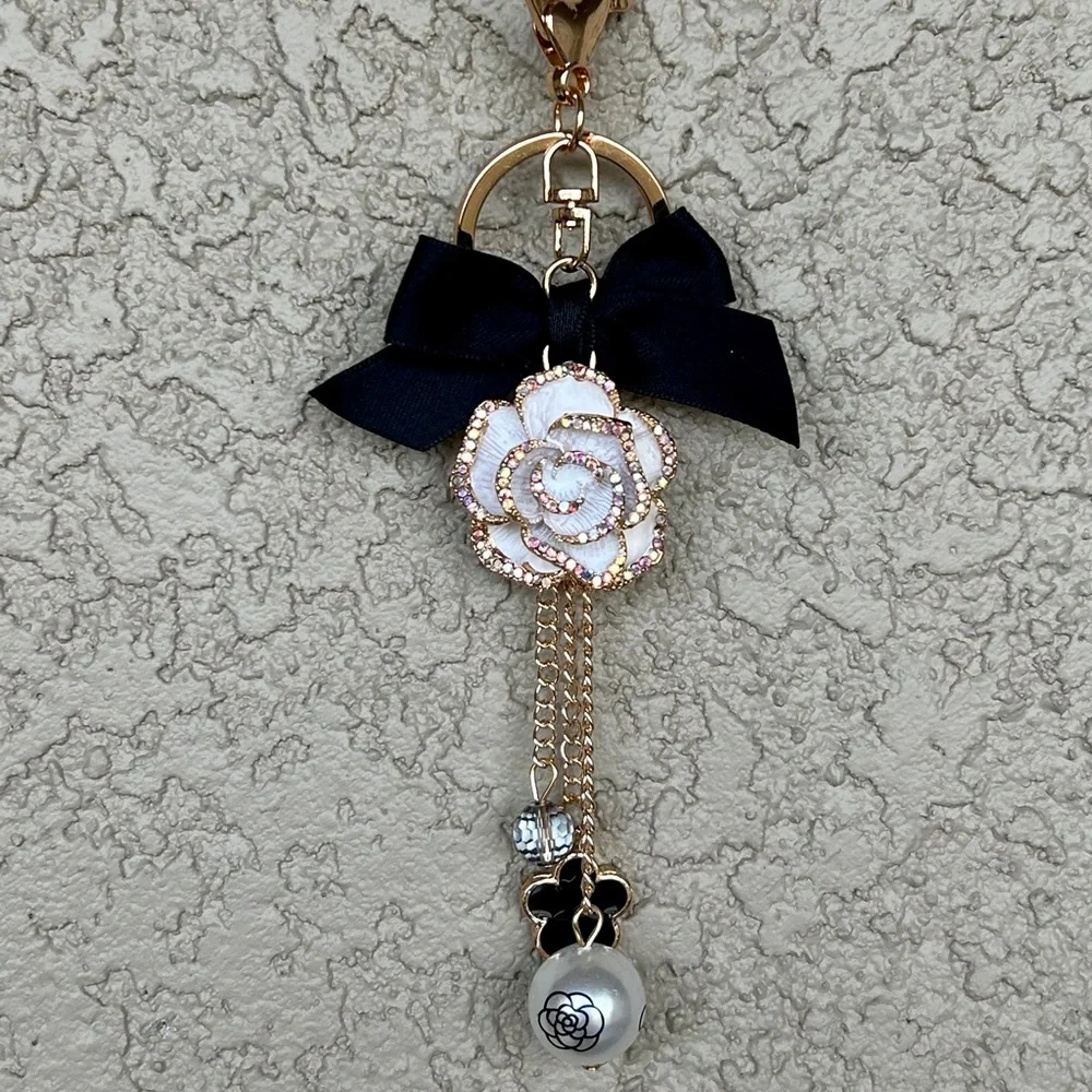 Luxe White Floral Keychain/Bag Charm with Black Bow